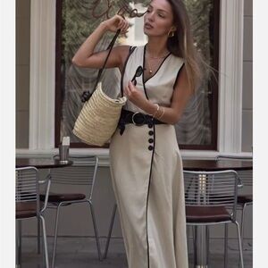 Elegant Beige Wrap Dress with Black Trim